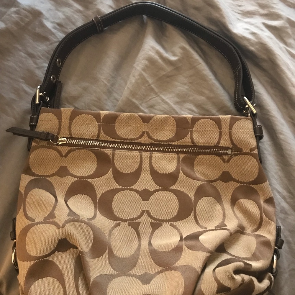 Tan medium size coach purse